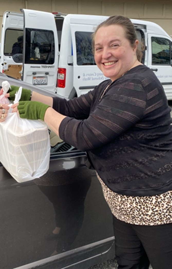 Launa Salsberry delivering meals