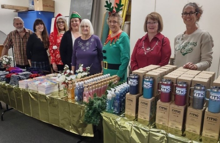 Volunteers at the gift table